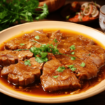 Duszona karkówka w sosie własnym