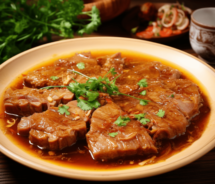 Duszona karkówka w sosie własnym